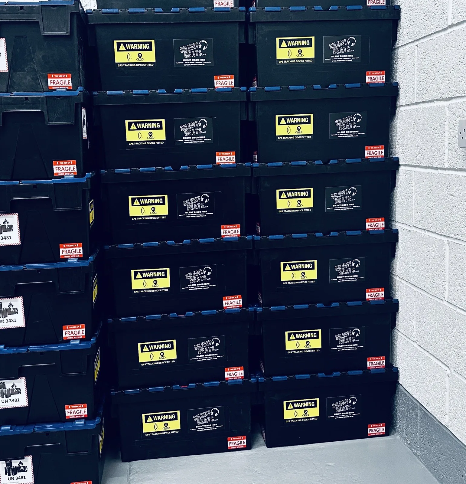 SilentBeats warehouse with stacked headphone crates ready for delivery